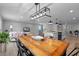 Open concept living space with dining area, kitchen and living room perfect for modern living at 25931 Azalea Ln, Astatula, FL 34705
