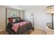 Comfortable bedroom with stylish bed frame and neutral decor at 2613 Howland Blvd, Deltona, FL 32738