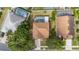 Aerial view of a home showcasing the pool and backyard with neighboring properties at 2837 Drifting Lilly Loop, Kissimmee, FL 34747