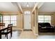 Inviting entrance with tile flooring and views of the dining and living areas at 2951 E Waco Dr, Deltona, FL 32738