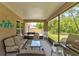 Covered patio with comfortable seating and a view of the backyard at 2951 E Waco Dr, Deltona, FL 32738