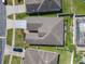 Aerial view of the property, showing the roof and fenced backyard at 2977 White Cedar Cir, Kissimmee, FL 34741