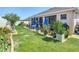 Well maintained backyard featuring a screened lanai and lovely landscaping at 2977 White Cedar Cir, Kissimmee, FL 34741