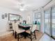 Elegant dining room featuring a dark wood table and stylish upholstered chairs at 2977 White Cedar Cir, Kissimmee, FL 34741