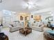 Inviting living room with a modern design and seamless flow to other living spaces at 2977 White Cedar Cir, Kissimmee, FL 34741