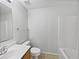 Simple bathroom featuring tile floors, a single sink vanity, toilet, and a bathtub at 3115 Whispering Trails St, Winter Haven, FL 33884