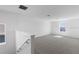 Spacious bonus room with neutral carpet, natural light and ready for customization at 3532 Douglas Fir Dr, Apopka, FL 32703