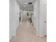 A bright and open foyer featuring neutral walls and tile floors, with views into the living areas at 3532 Douglas Fir Dr, Apopka, FL 32703