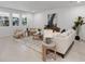 Bright living space with modern furnishings, a large rug, and plenty of natural light at 3532 Douglas Fir Dr, Apopka, FL 32703