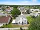 An aerial view shows the back of the house and the spacious backyard at 3660 Ventura Club Cir, Orlando, FL 32822