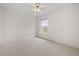 A clean, neutral bedroom with a ceiling fan and carpeted floors at 3660 Ventura Club Cir, Orlando, FL 32822