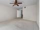 Spacious bedroom with neutral walls and carpet at 3660 Ventura Club Cir, Orlando, FL 32822