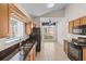 Kitchen features stainless steel appliances, tile floors, and a breakfast nook with a view at 3660 Ventura Club Cir, Orlando, FL 32822