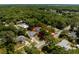 Boundary lines shown in an aerial view of the neighborhood homes with mature trees and proximity to roadways at 441 S Blue Lake Ave, Deland, FL 32724