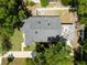 Aerial view of the home featuring a well-maintained roof and fenced backyard at 441 S Blue Lake Ave, Deland, FL 32724