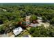 Boundary lines shown in an aerial view of the neighborhood with mature trees at 441 S Blue Lake Ave, Deland, FL 32724