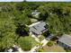 Charming single-story home with a large, private backyard surrounded by mature trees at 441 S Blue Lake Ave, Deland, FL 32724