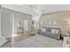 Cozy living room with gray walls, wood floors, comfortable seating, and plenty of natural light at 441 S Blue Lake Ave, Deland, FL 32724