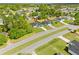 Aerial view of a home's location in a residential neighborhood surrounded by lush greenery at 443 Marion Oaks Crse, Ocala, FL 34473