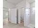 Bathroom featuring a walk-in shower with white tile and a separate water closet at 443 Marion Oaks Crse, Ocala, FL 34473