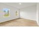Bright bedroom with wood-look floors, providing a comfortable living space at 443 Marion Oaks Crse, Ocala, FL 34473