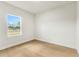Bright bedroom with light wood flooring and a window with a lovely view at 443 Marion Oaks Crse, Ocala, FL 34473