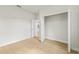 This bright bedroom has an open closet and light wood flooring at 443 Marion Oaks Crse, Ocala, FL 34473