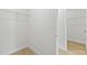 Walk-in closet with shelving and rod, offering ample storage space at 443 Marion Oaks Crse, Ocala, FL 34473