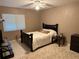 Calm bedroom featuring neutral colors, comfortable furnishings, and a ceiling fan at 510 Cranes Way # 105, Altamonte Springs, FL 32701