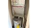 Water heater and HVAC system inside utility closet at 510 Cranes Way # 105, Altamonte Springs, FL 32701
