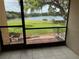 Enjoy serene lake views from the screened-in lanai, perfect for relaxing and entertaining at 510 Cranes Way # 105, Altamonte Springs, FL 32701