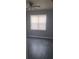 Well lit bedroom with dark wood flooring, grey walls, and a ceiling fan at 539 Clark St, Maitland, FL 32751