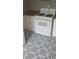 Well-lit kitchen featuring white appliances, and patterned flooring at 539 Clark St, Maitland, FL 32751