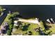 Aerial view showcasing the park's beach, pier, and recreational area, nestled by the serene lake at 604 Blue Lake Dr, Longwood, FL 32779