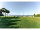 Expansive lakeside park with lush greenery, picnic spots, and beautiful lake views at 604 Blue Lake Dr, Longwood, FL 32779