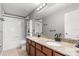 Bathroom featuring granite countertops, double sinks, tile floors, and a shower-tub combination at 660 Egret Place Dr, Winter Garden, FL 34787