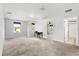Spacious bedroom features neutral carpet, light walls, and bright windows creating a welcoming atmosphere at 660 Egret Place Dr, Winter Garden, FL 34787
