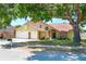 Charming two-story home features a brick-accented facade and a spacious two-car garage at 6630 Abeydon Ct, Orlando, FL 32818