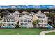 Stunning golf course homes feature sparkling pools, outdoor entertaining spaces, and lush green landscaping at 7388 Gathering Ct, Reunion, FL 34747