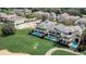 An inviting backyard features a private pool and a covered patio, perfect for outdoor living and entertaining at 7388 Gathering Ct, Reunion, FL 34747