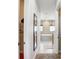 Bathroom with soaking tub and walk-in closet at 7388 Gathering Ct, Reunion, FL 34747
