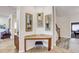 Hallway nook with granite countertop desk space with artwork and views to other living spaces at 7388 Gathering Ct, Reunion, FL 34747