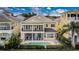 Stunning two-story home with a private pool, spa, patio, and balcony, perfect for outdoor living and entertaining at 7388 Gathering Ct, Reunion, FL 34747
