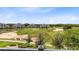 Picturesque golf course and community buildings seen from the balcony at 7649 Heritage Crossing Way # 302, Reunion, FL 34747