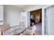 Relaxing balcony with seating, offering a glimpse into the adjacent living room space at 7649 Heritage Crossing Way # 302, Reunion, FL 34747