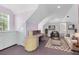 This is a bonus room with desk and a sitting area with door to the outside at 910 Cypress Ave, St Cloud, FL 34769