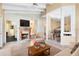 Inviting living room with a fireplace, comfortable seating, and an open layout at 910 Cypress Ave, St Cloud, FL 34769