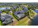 Panoramic view of a community showcasing the screened-in pools, waterfront properties, and neighborhood layout at 922 Home Grove Dr, Winter Garden, FL 34787