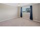 Bedroom with carpet, ceiling fan, neutral walls, and a window with dark curtains at 922 Home Grove Dr, Winter Garden, FL 34787