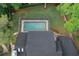 Aerial view showcasing the screened-in pool and the home's roof at 934 Deerwood Loop, Longwood, FL 32779
